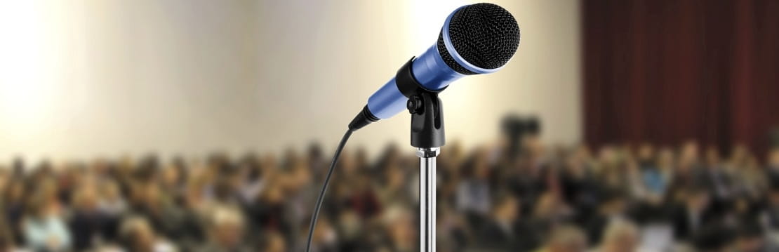Microphone in front of a crowd